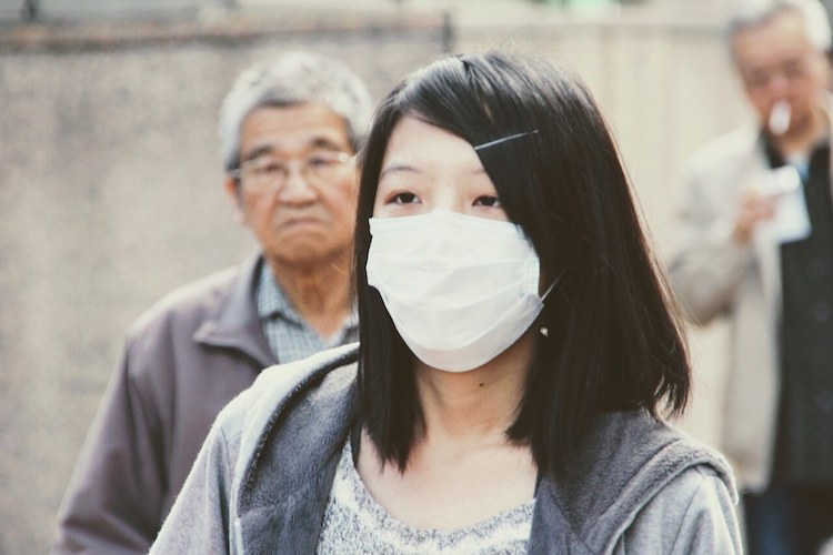 Wear a Flu Mask to Avoid Sickness while Travelling