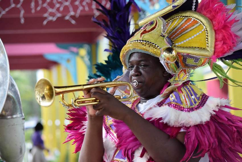 festival man blowing a trumpet